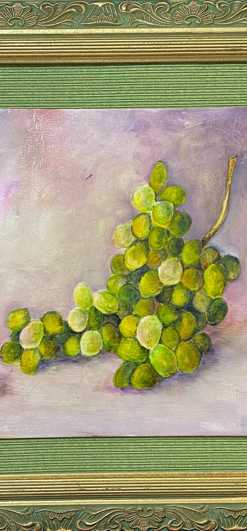 Gorgeous Green Grapes Oil Painting floating on green support framed in an engraved green and gold by Mary Gullette