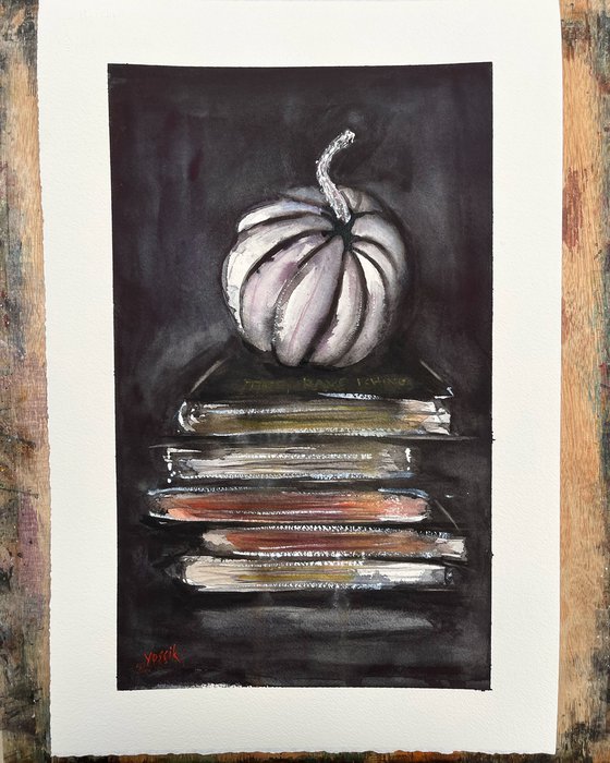 pumpkin on a pile of books