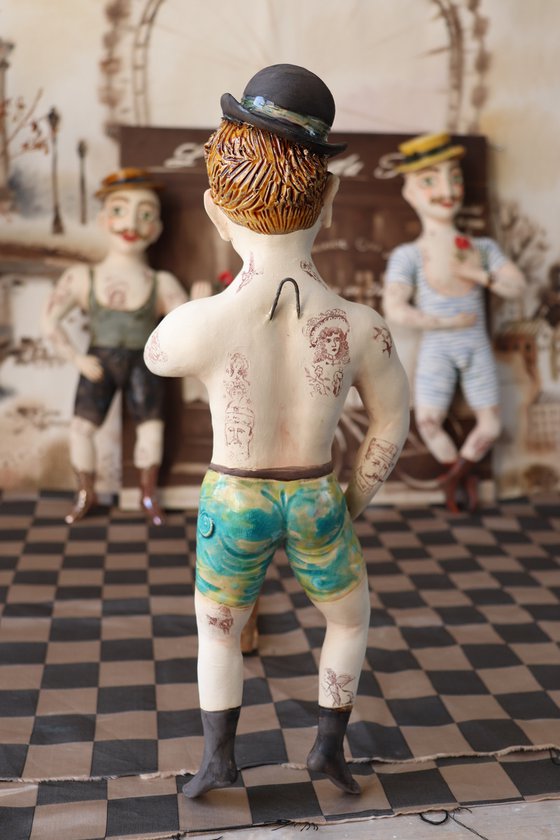 Young Gentlemen with a hat. Vintage Strongman. Wall sculpture by Elya Yalonetski.