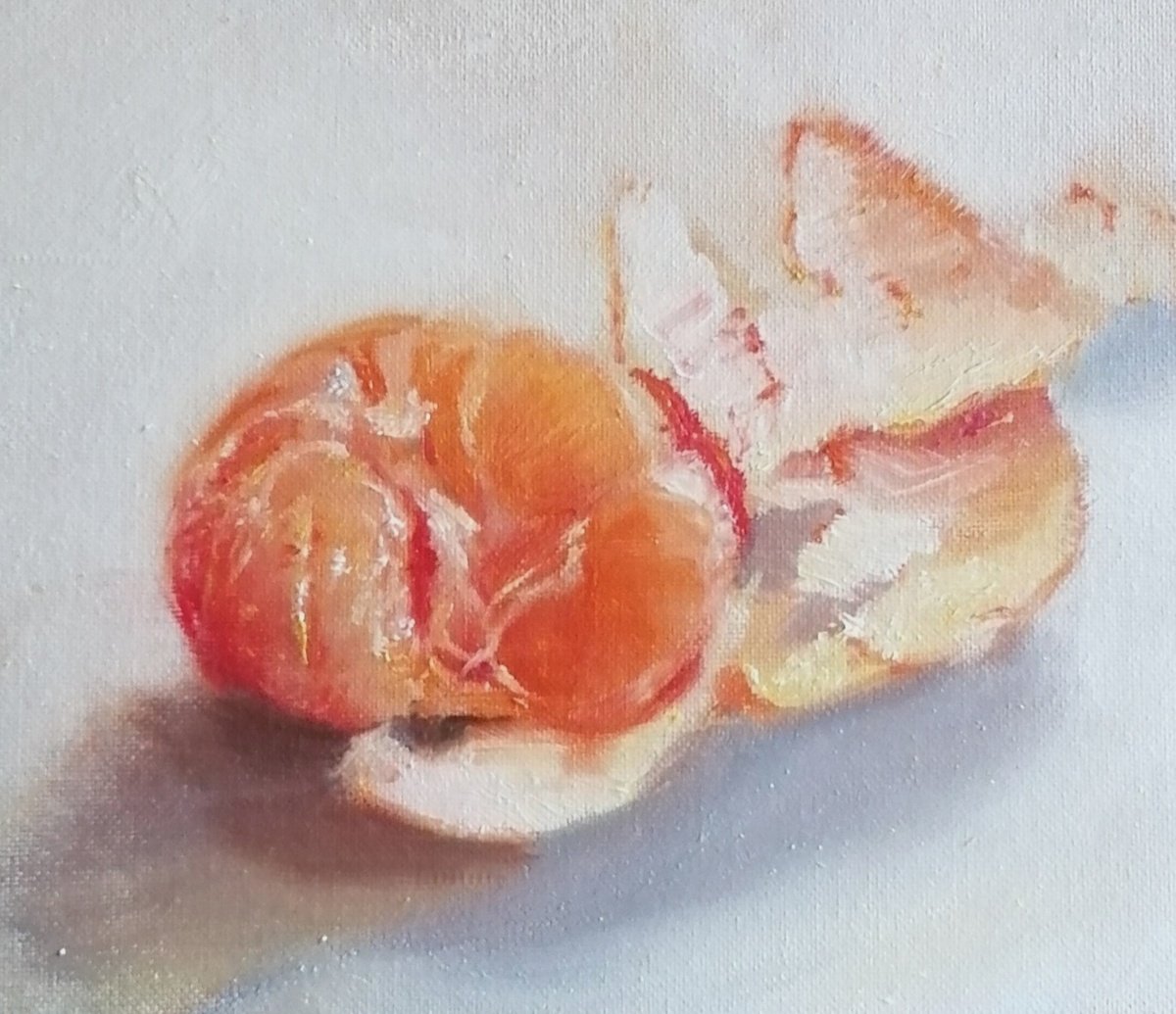 Peeled tangerine by Rosemary Burn