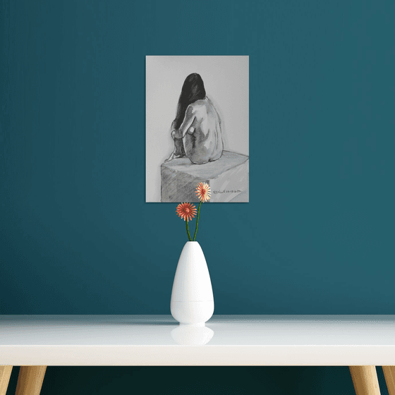 Seated female nude