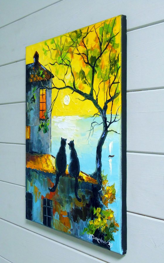 Cats Watching the Sunset Together