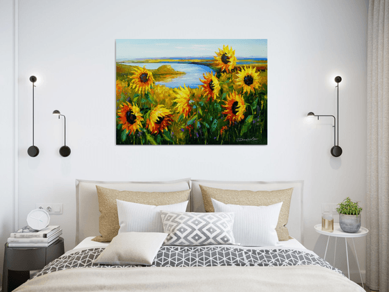 Sunflowers in the wind by the river