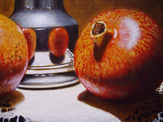 2 pomegranates with pewter jug