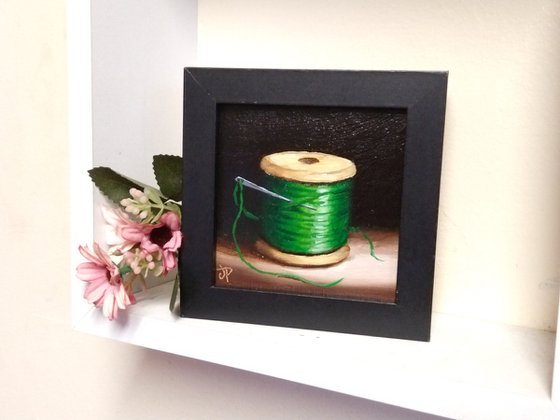 Little Green cotton reel  still life