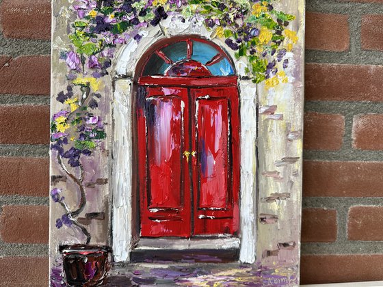 Red door with flowers