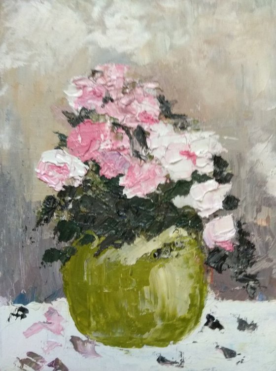 Floral arrangement with pink roses