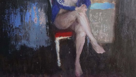 Lucile on red chair