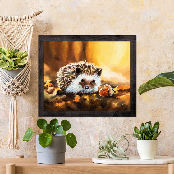 Hedgehog with acorn in fall