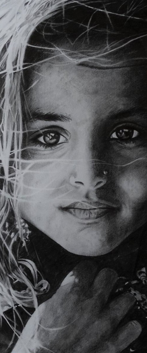 Afghan girl by Julian Wheat