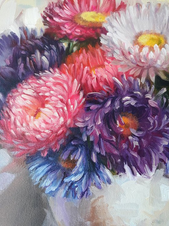 Autumn asters flowers in white vase, Floral fruit still life