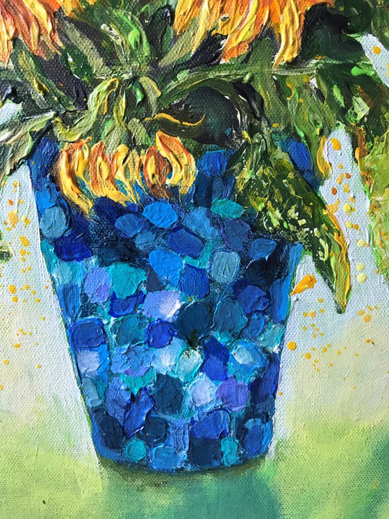 Yellow Sunflowers in a Blue Vase