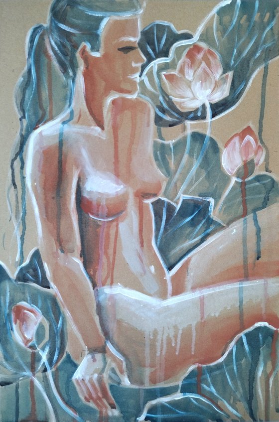 Naked woman in blooming water lilies