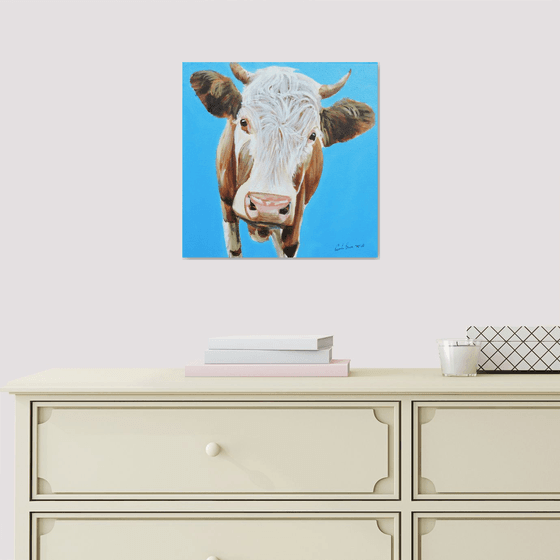 Cow portrait painting in blue