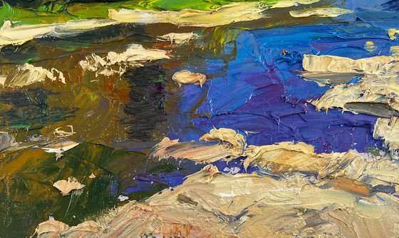 River against the Backdrop of Mountain Slopes