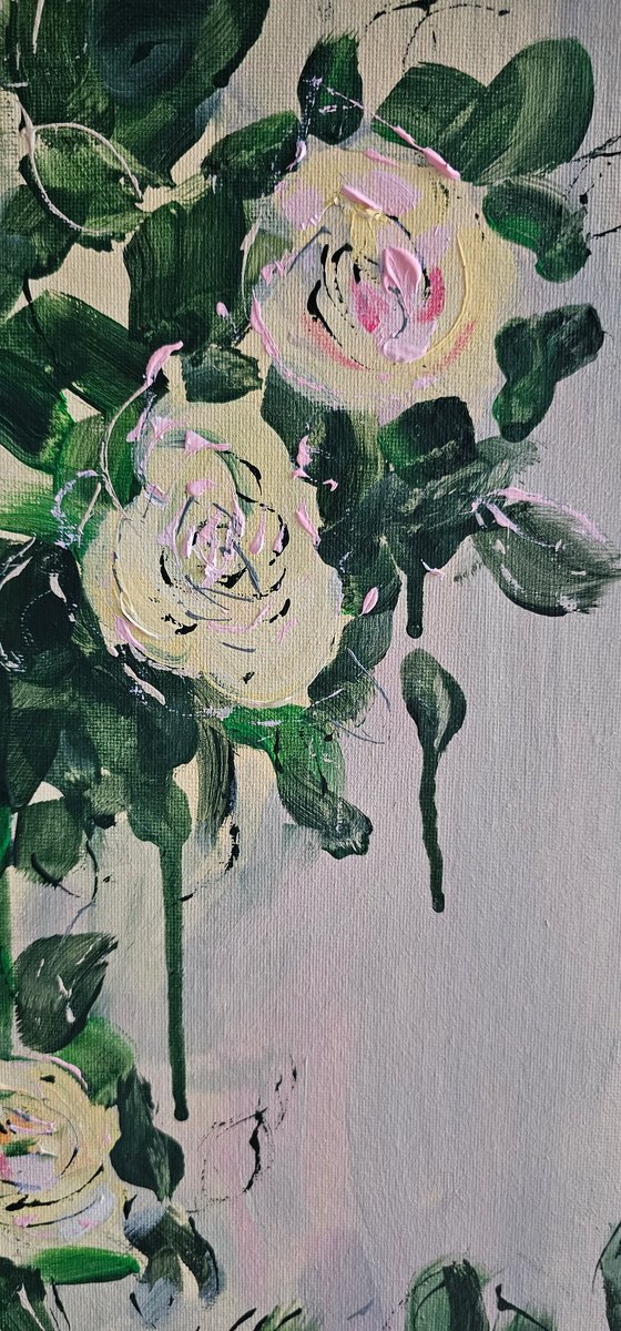 Blooming abstract rose garden in pale yellow