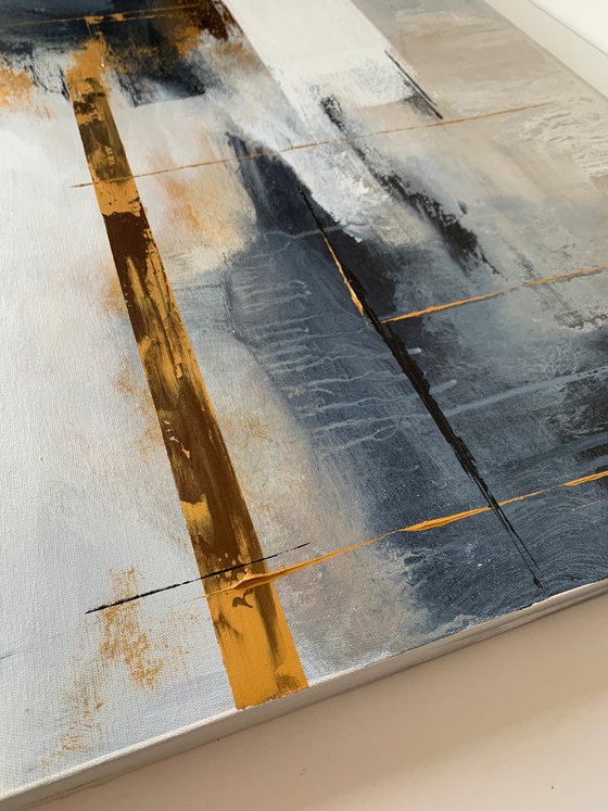 Abstraction in gray, gold and blue tones.