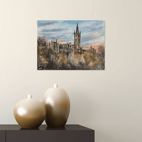 Glasgow university under a setting sun