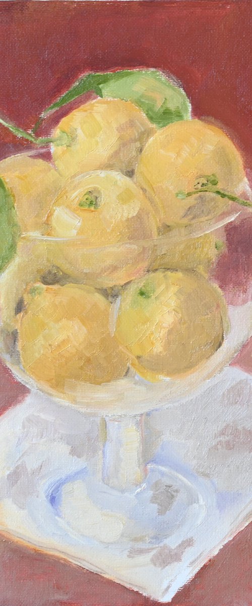 Lemons in glass bowl by Elena Zapassky