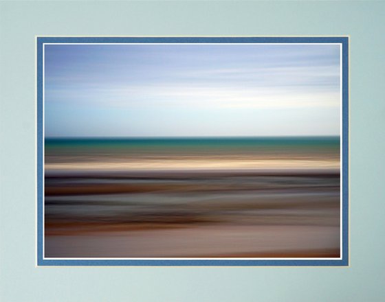 On the Beach, from the bottom, pebbles, sand, rocks, sea, sky and clouds. ICM photography