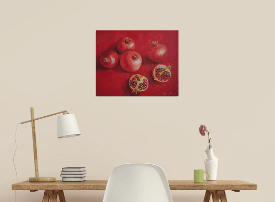 Pomegranate on red