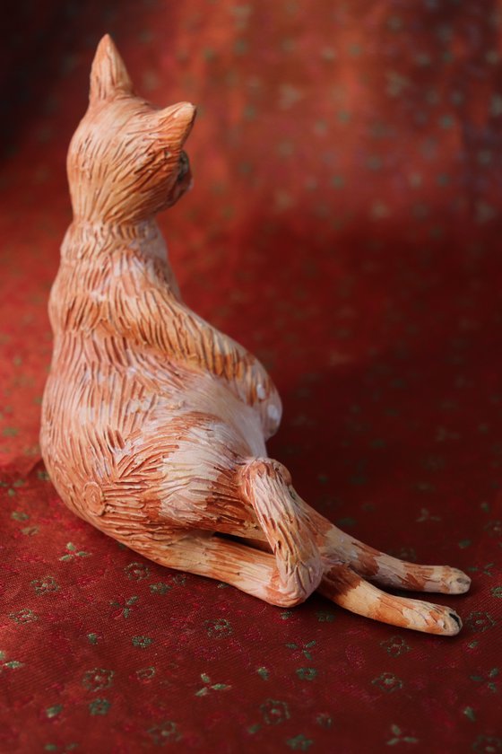 Red Fury Resting. Ceramic cat sculpture.