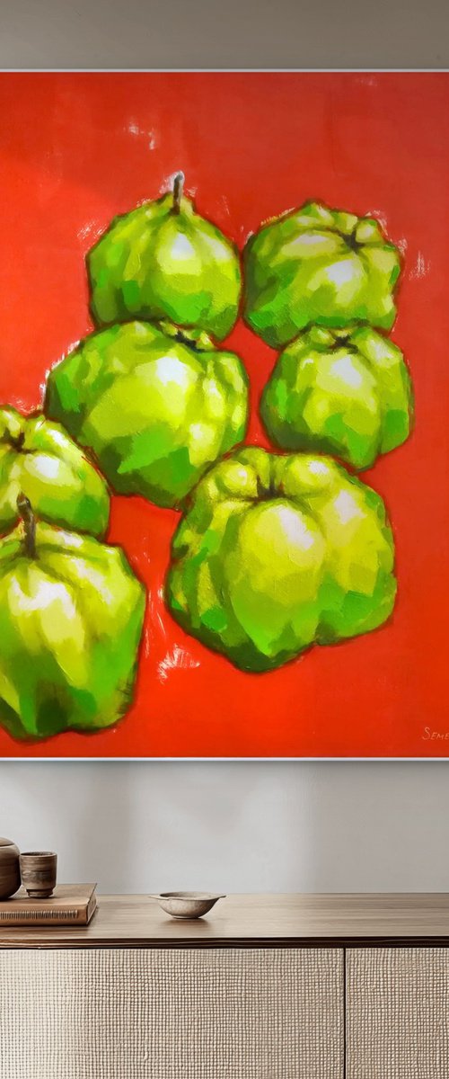 Green fruits on red background by Evgen Semenyuk