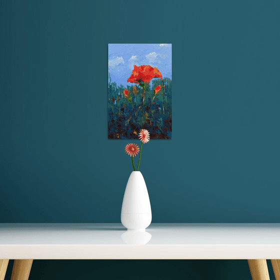 Red poppy flowers in field. Original gift for love