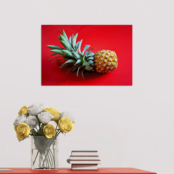 Pineapple on red background