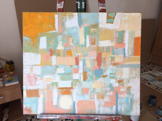 Sun and moon over city