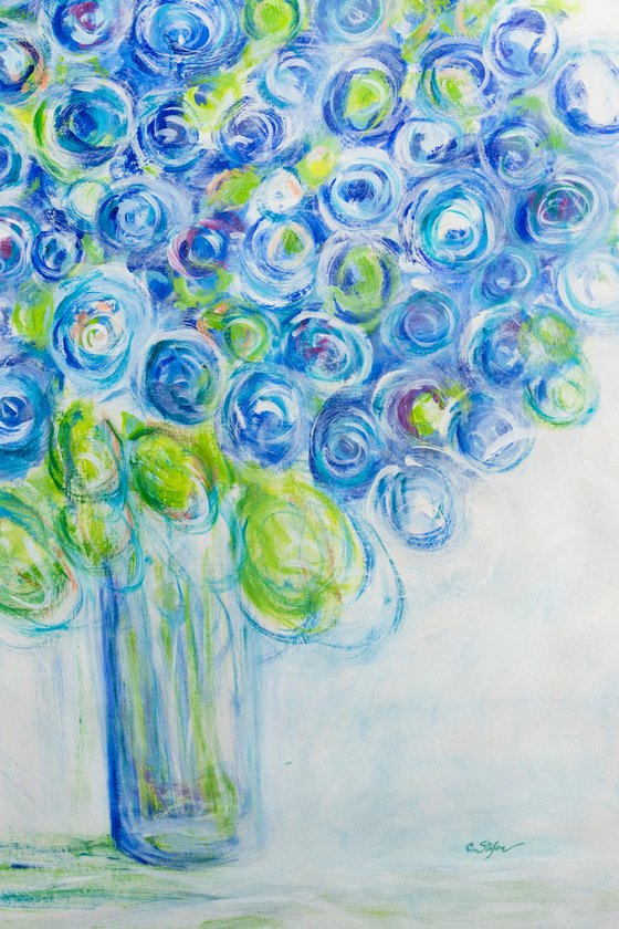 Vase with blue flowers