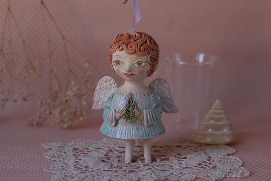 Tiny hanging sculpture. Angel