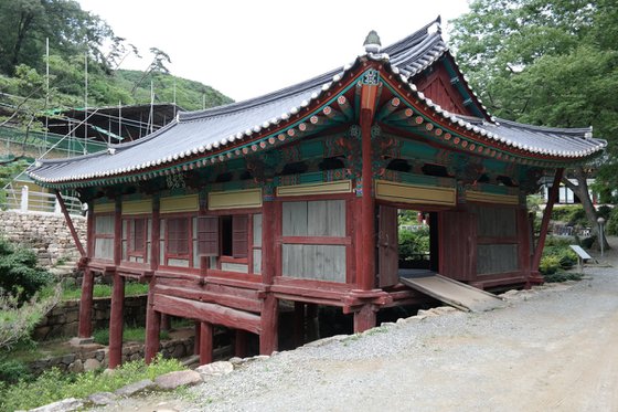 A Red Bridge Beneath the Roof