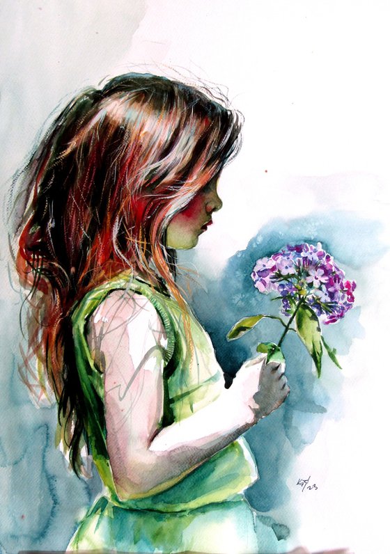 Little girl with purple flower