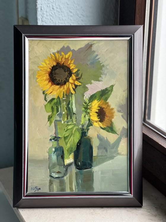 Sunflowers with little blue glasses