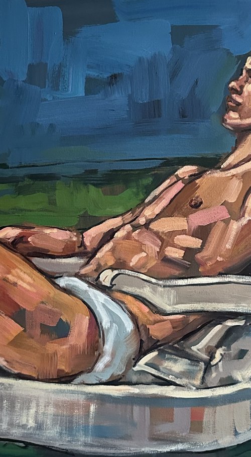 Naked man lying on sunbed by Emmanouil Nanouris