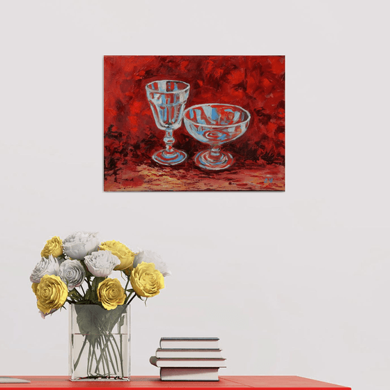 Wine glass on red.