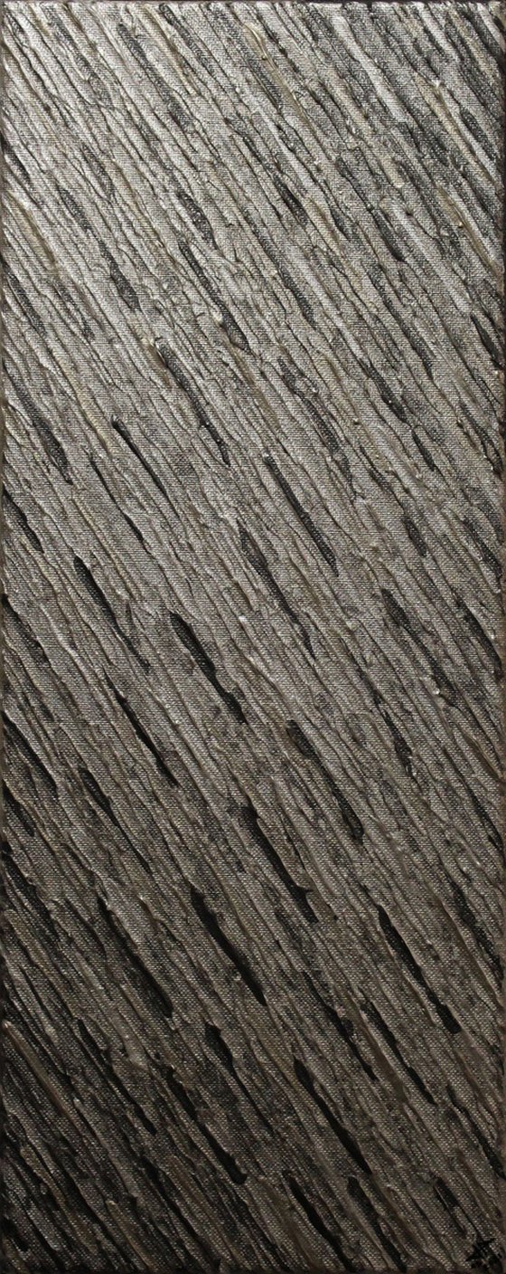 Iridescent grey pewter knife texture