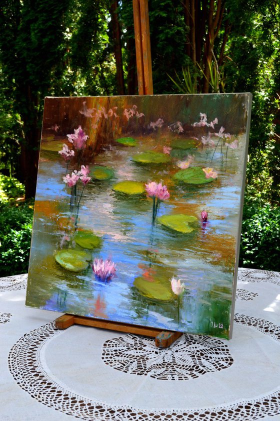 Pond with pink lilies