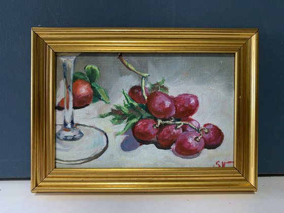 Grapes and glass of wine.