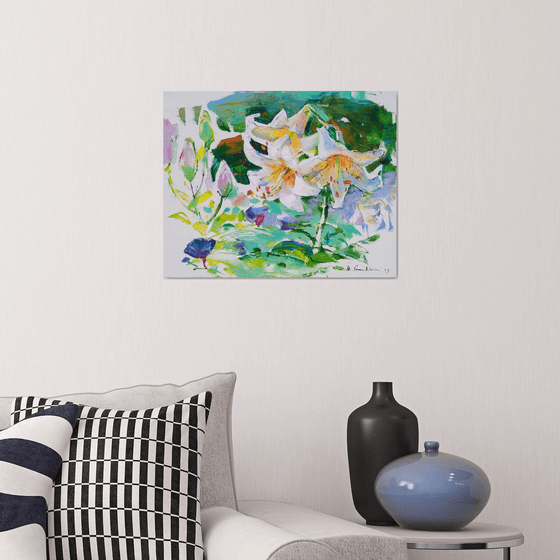 White lilies . Morning garden