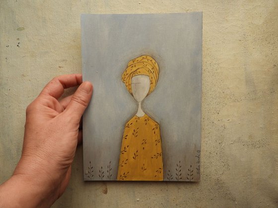 Woman in yellow