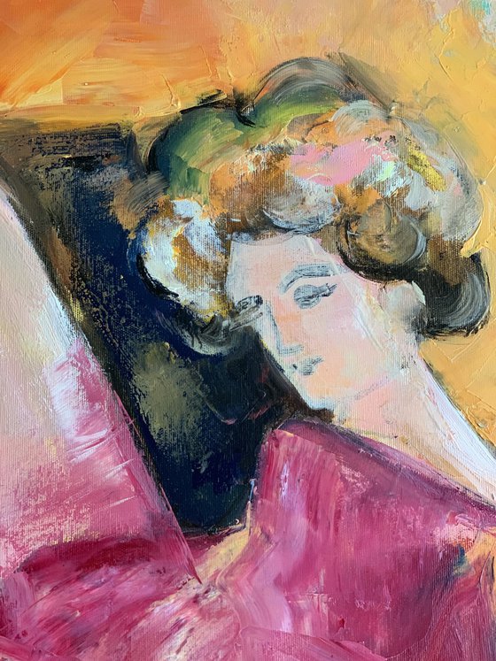 Woman sitting on the armchair