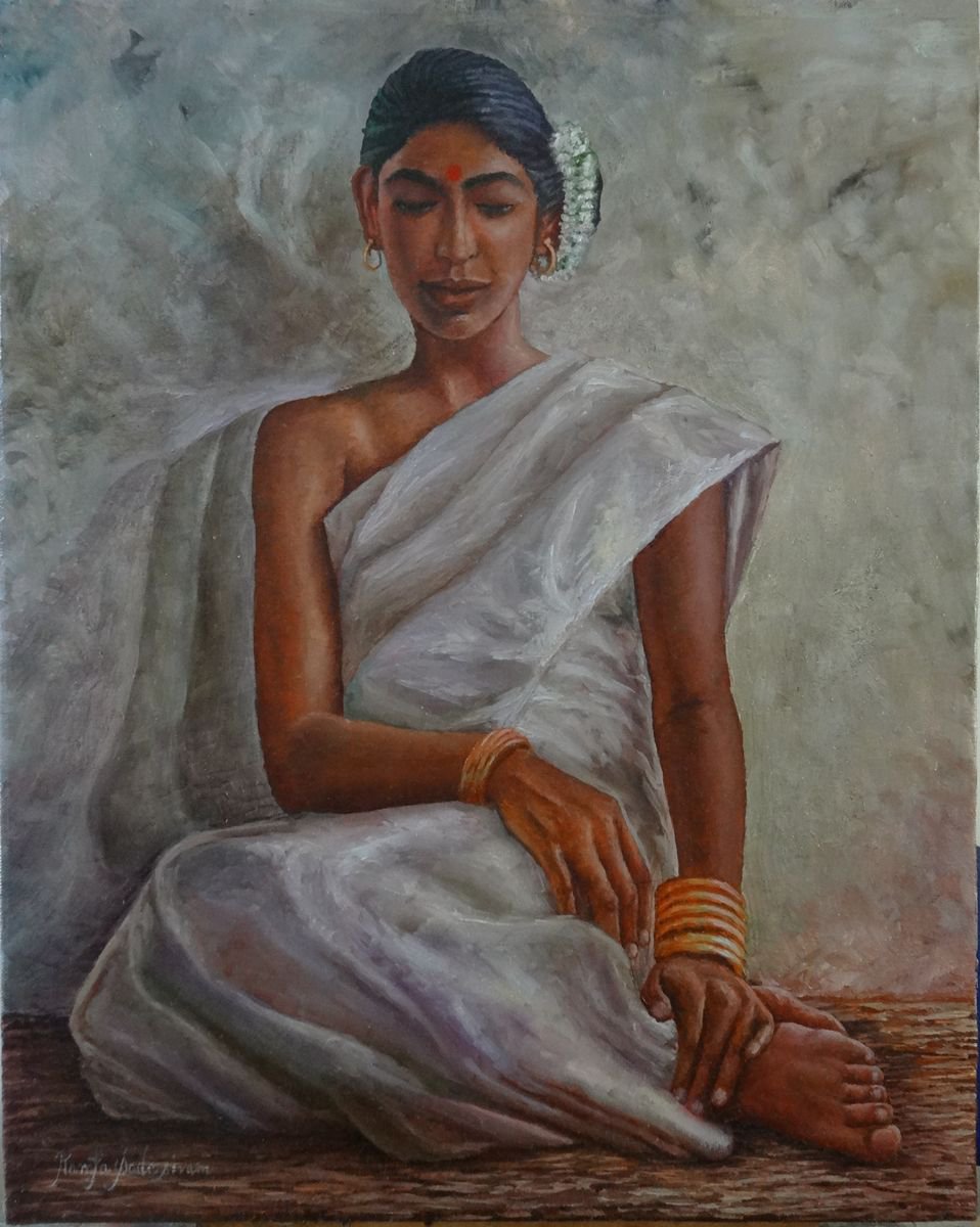 Woman in white saree by Ramya Sadasivam