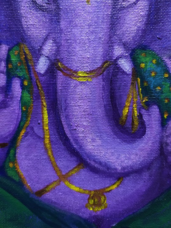 Purple Ganesha in green silk