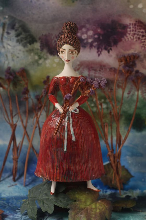Beautiful Dame with Twirled Updo in Red Dress.  Wall sculpture by Elya Yalonetski