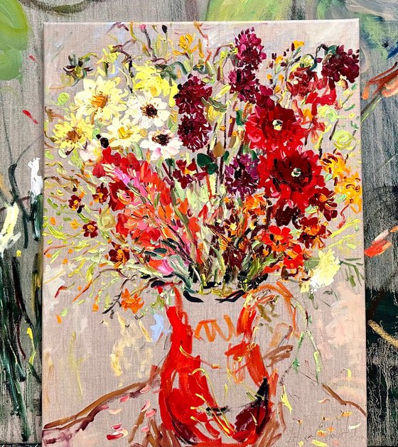 Summer flowers in a red jug