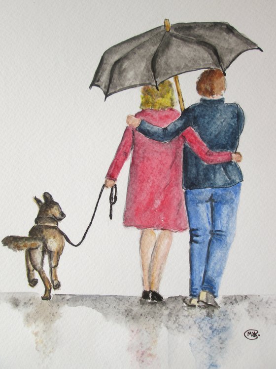 Couple walking the dog together