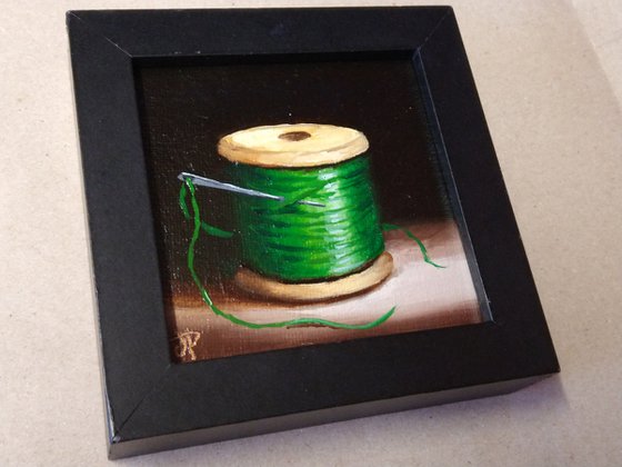 Little Green cotton reel  still life