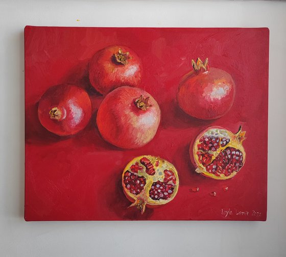 Pomegranate on red